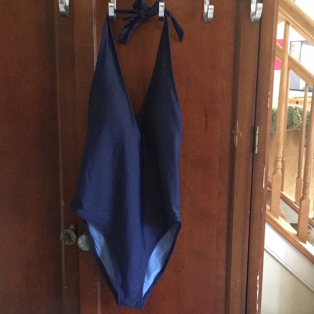 Blue one piece bathing suit.